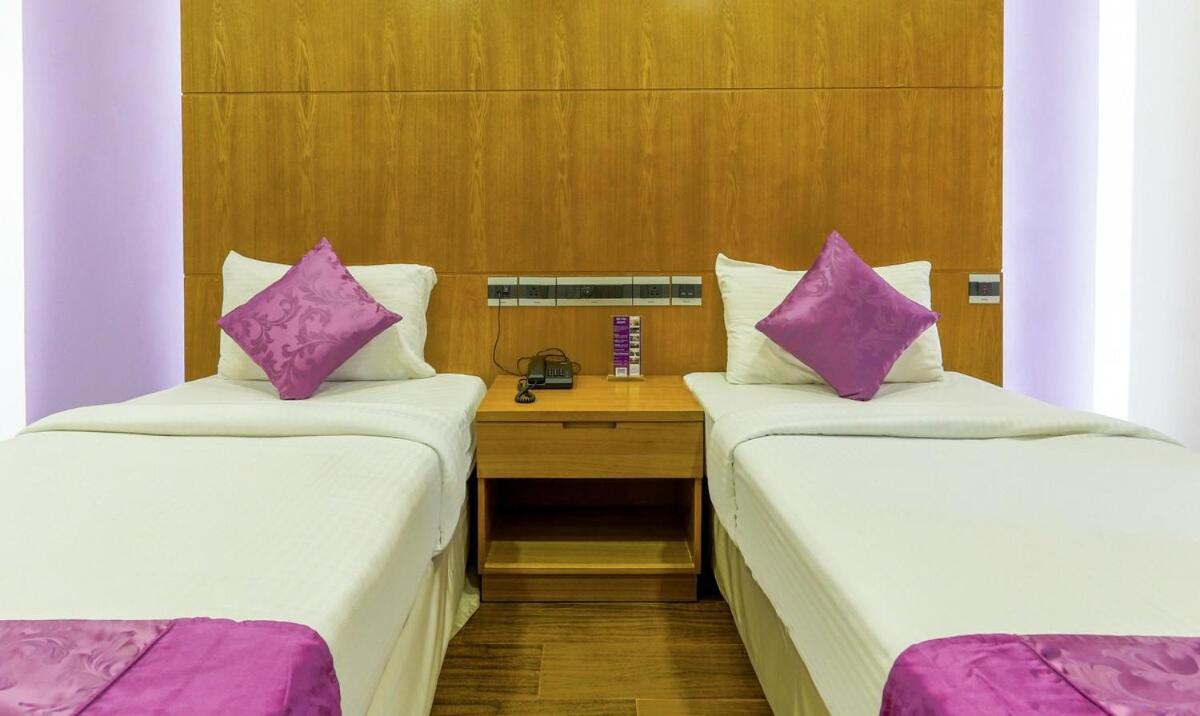 Medora Hotel โคชิโคด ภายนอก รูปภาพ