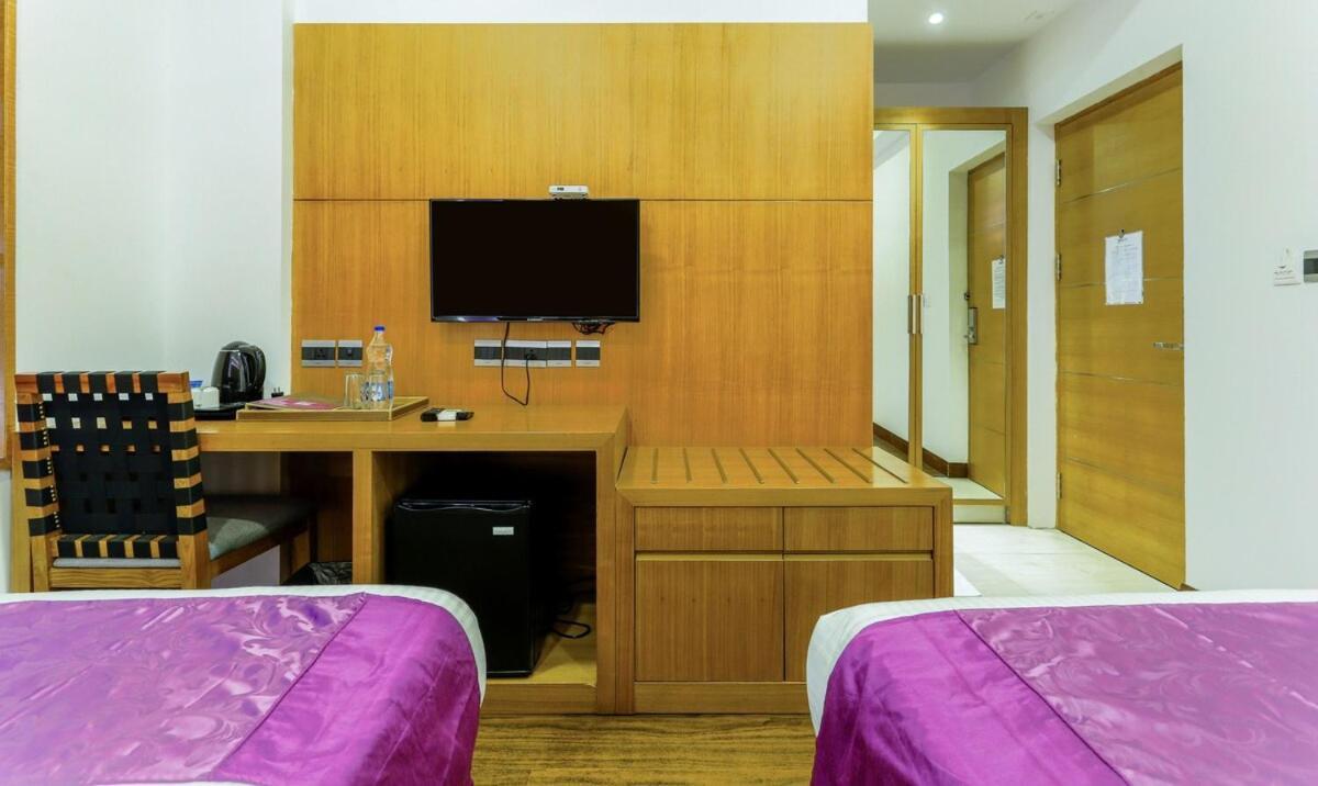 Medora Hotel โคชิโคด ภายนอก รูปภาพ