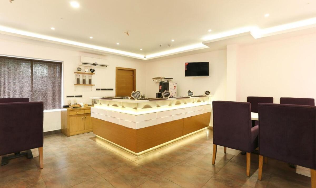 Medora Hotel โคชิโคด ภายนอก รูปภาพ